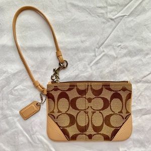 New! COACH Brown and Tan wristlet. 5.5inX4in.